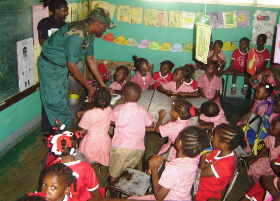 Ranger Poyser and Youth PATH make a presentation at a basic school
